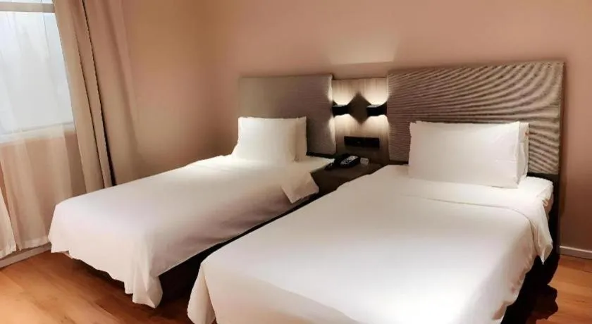 Bed in Hanting Hotel Shanghai People Square