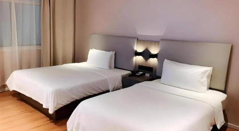 Bed in Hanting Hotel Shanghai People Square