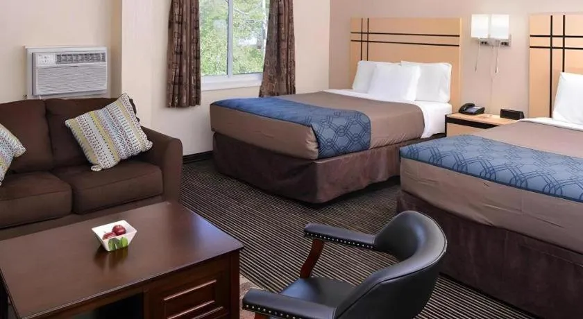 Bed in Econo Lodge Rochester I-90 & I-390