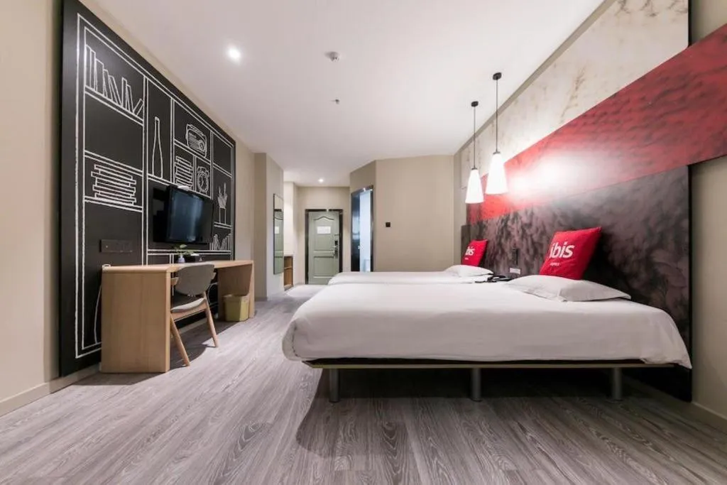 Bed in Ibis Nantong Qingnian