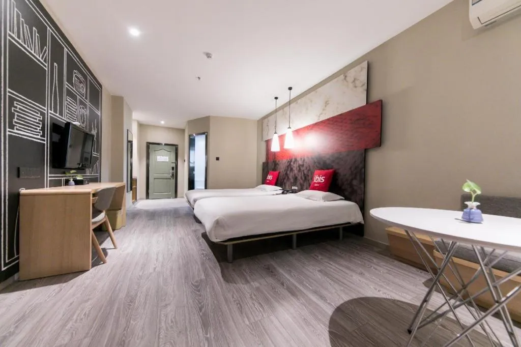 Bed in Ibis Nantong Qingnian