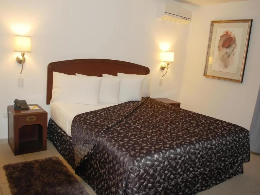 Bed in Terranova Suites