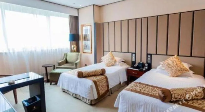 Bed in Jiuhua Jin Jiang International Hotel