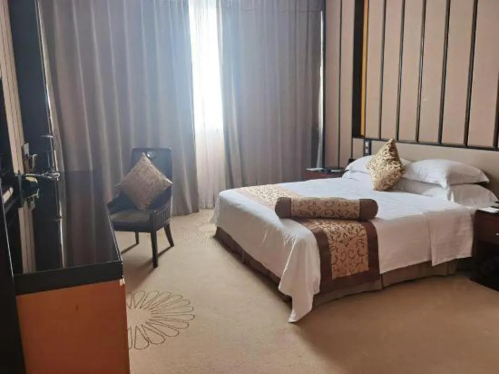 Bed in Jiuhua Jin Jiang International Hotel