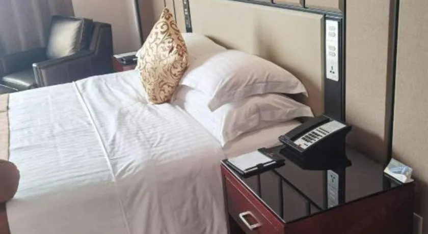 Bed in Jiuhua Jin Jiang International Hotel