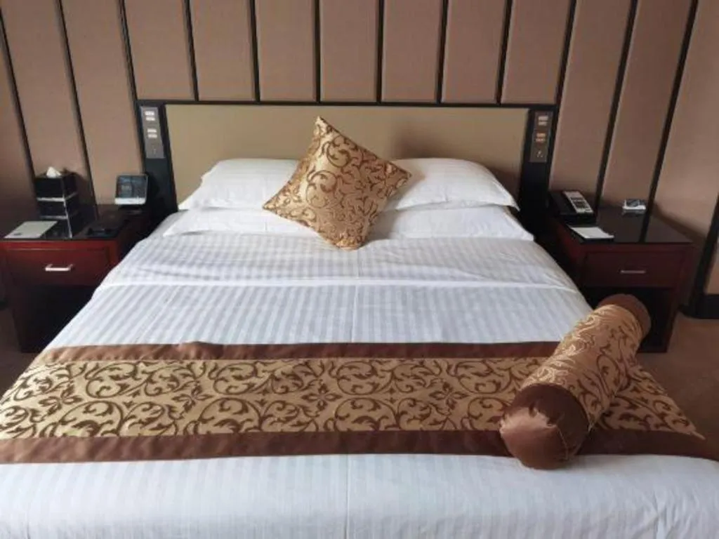Bed in Jiuhua Jin Jiang International Hotel