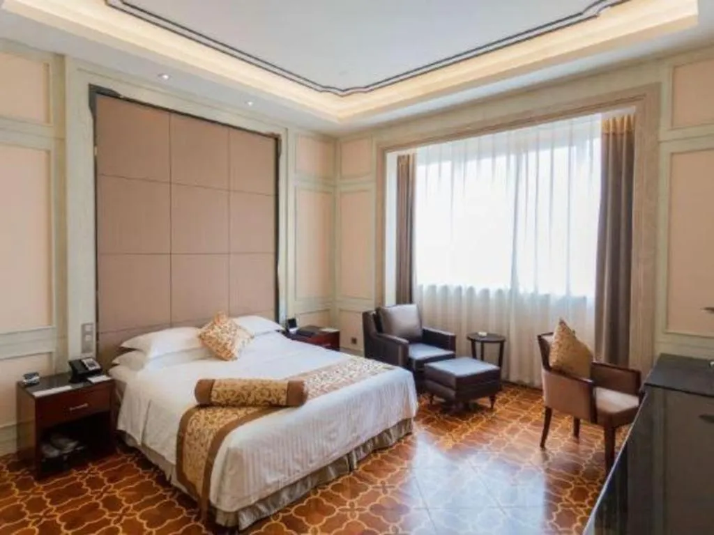 Bed in Jiuhua Jin Jiang International Hotel