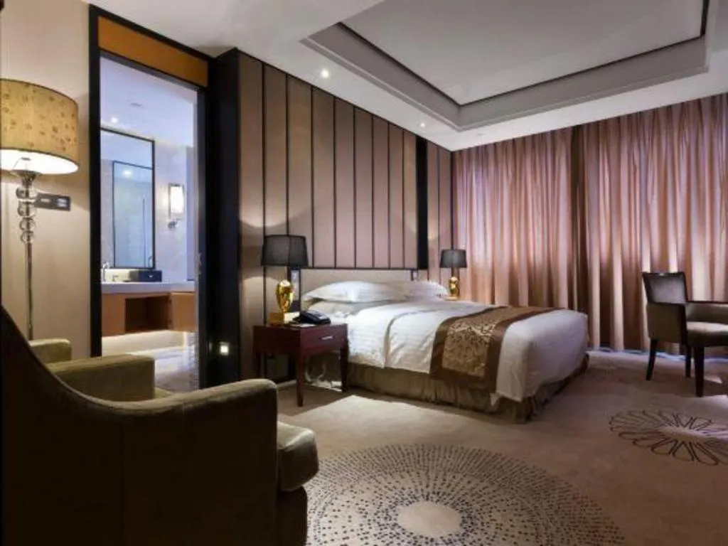 Bed in Jiuhua Jin Jiang International Hotel