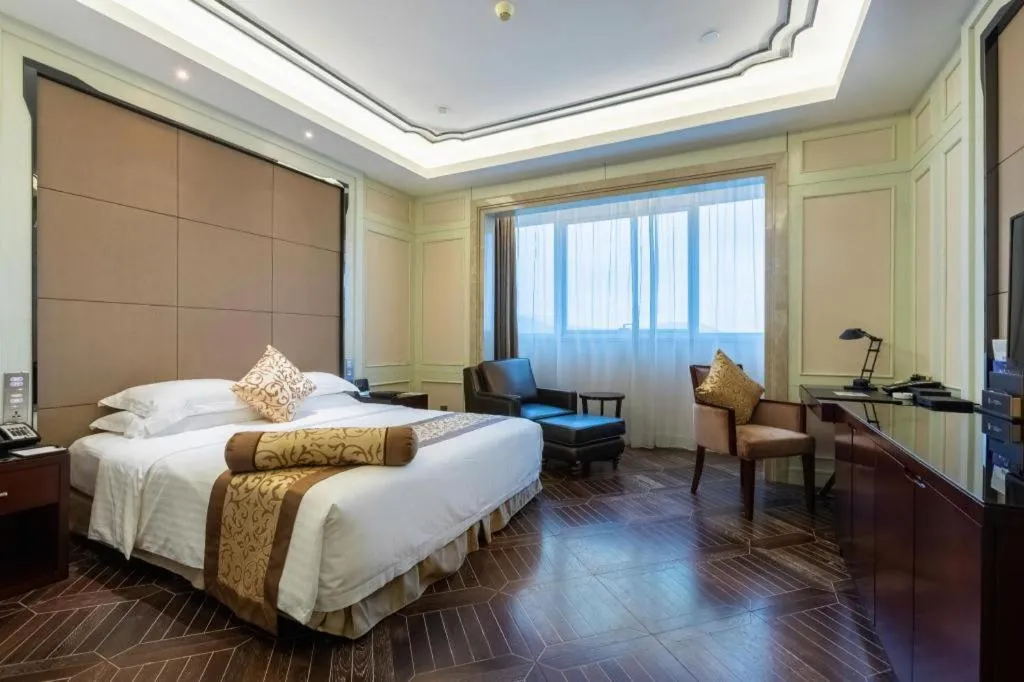 Bed in Jiuhua Jin Jiang International Hotel