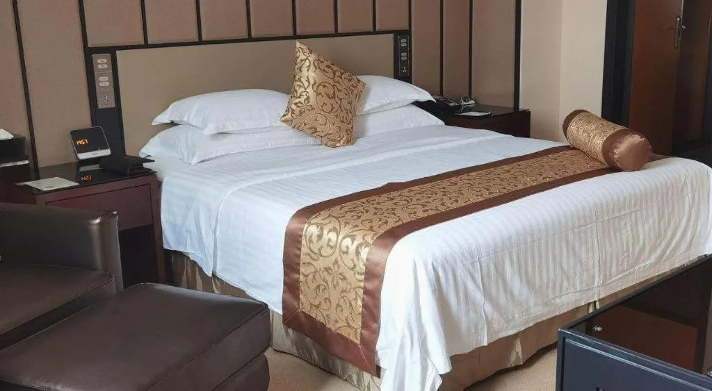 Bed in Jiuhua Jin Jiang International Hotel