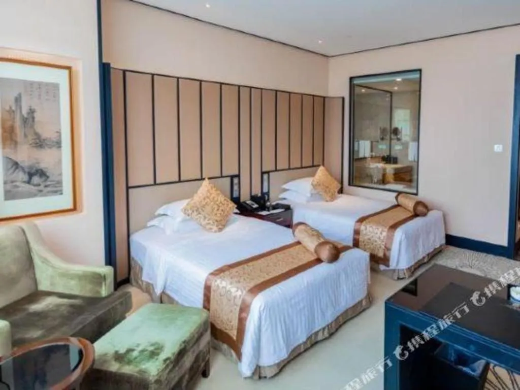 Bed in Jiuhua Jin Jiang International Hotel