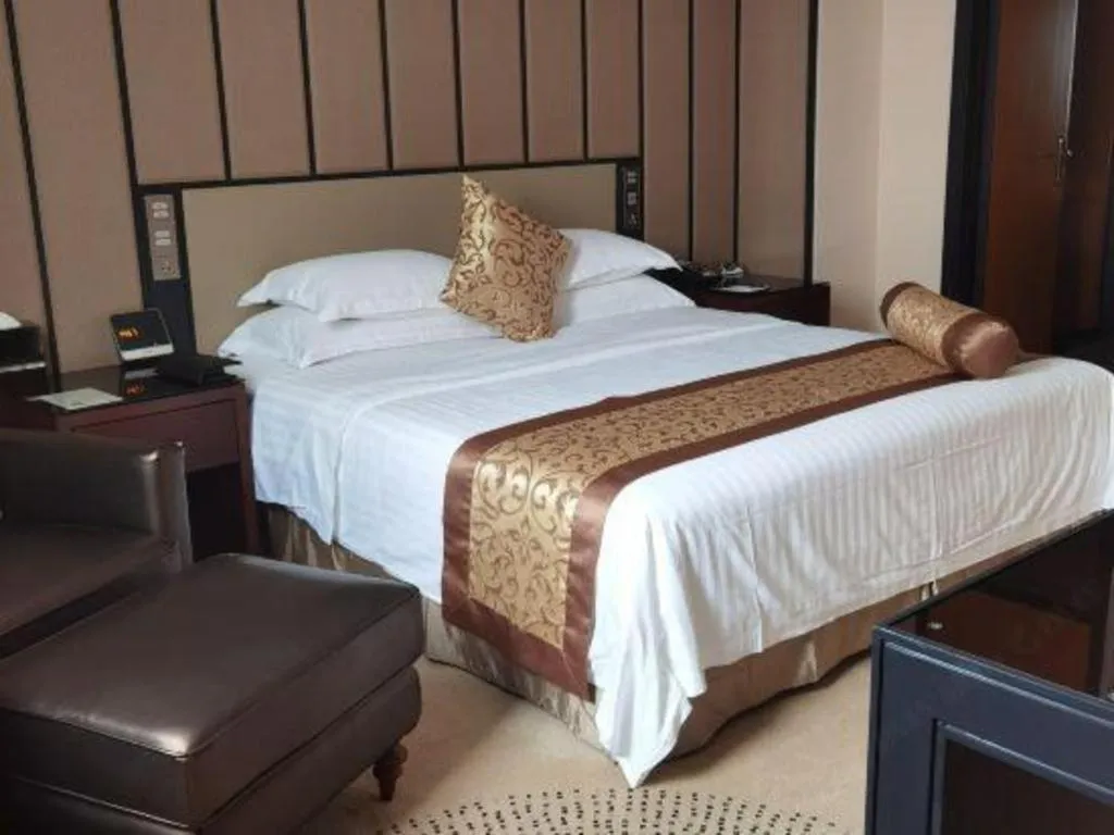 Bed in Jiuhua Jin Jiang International Hotel