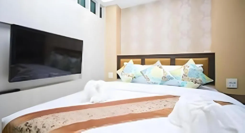 Bed in Phi Phi Nice Beach Hotel Hip