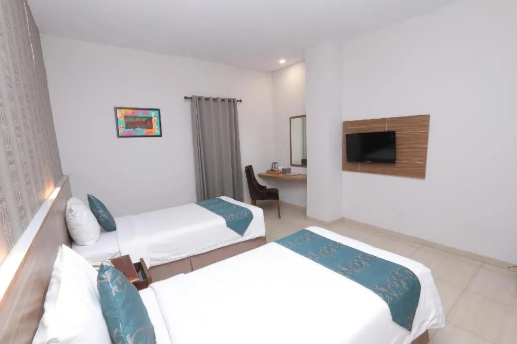 Bed in Grand Amira Hotel Solo, Azana Hotels Collection