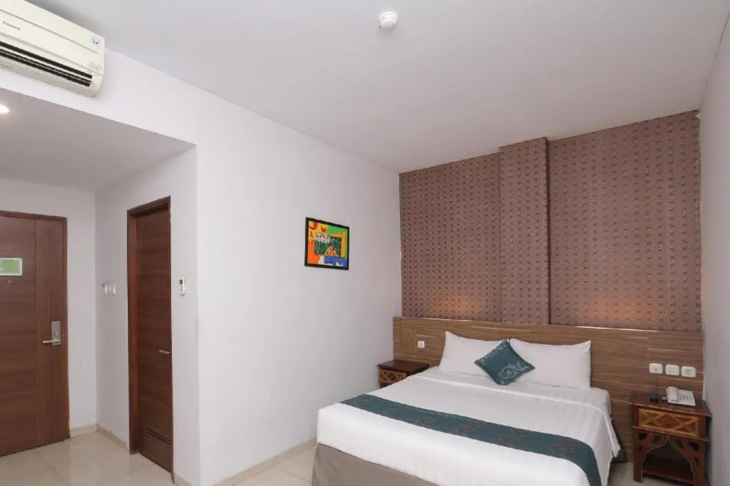 Bed in Grand Amira Hotel Solo, Azana Hotels Collection