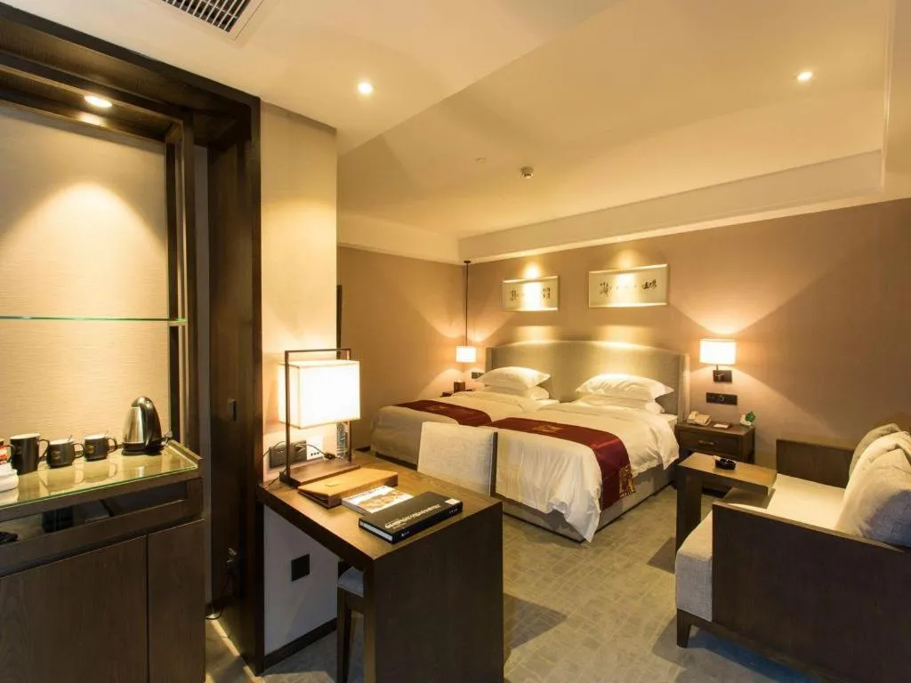 Bed in Zhuhai Starlight Hotel