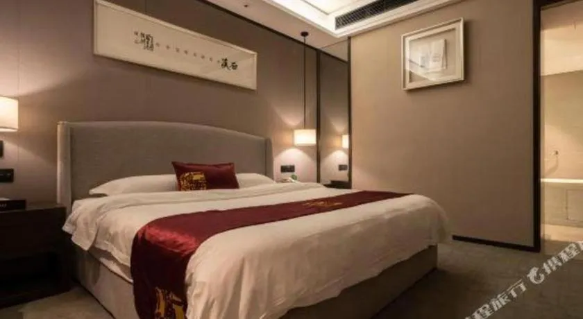 Bed in Zhuhai Starlight Hotel