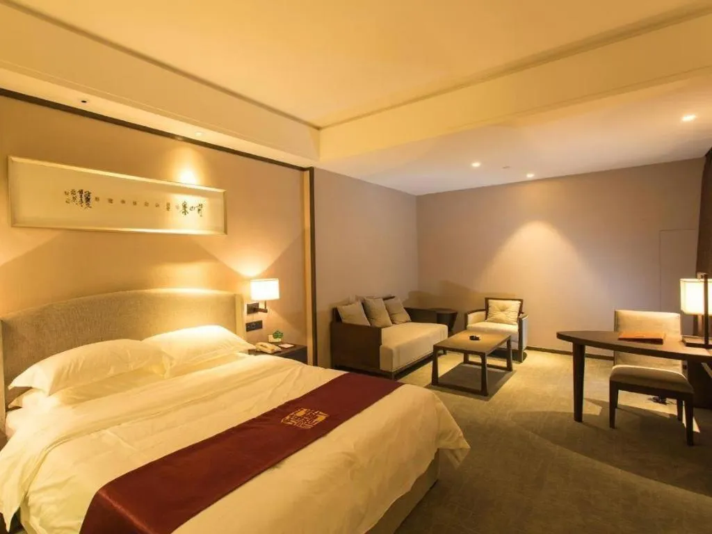 Bed in Zhuhai Starlight Hotel