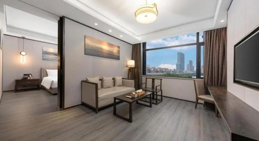 Bed in Zhuhai Starlight Hotel