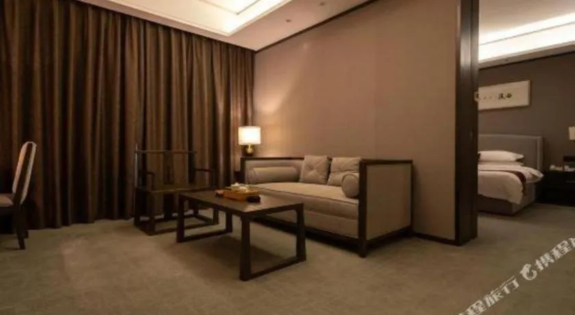 Bed in Zhuhai Starlight Hotel