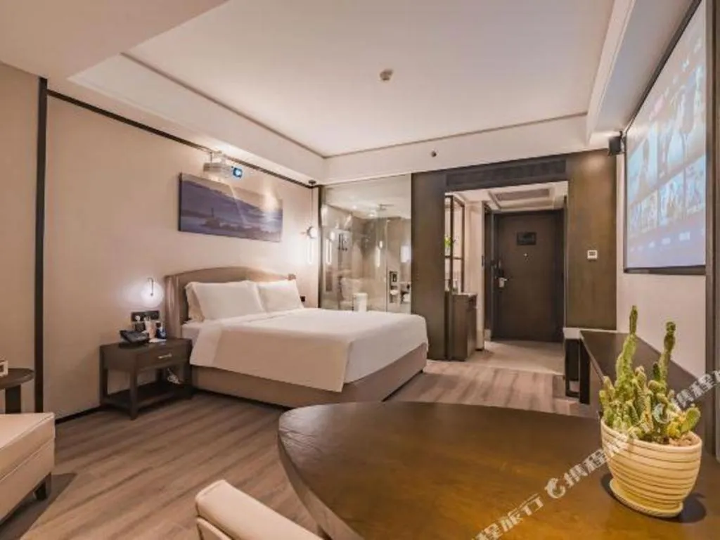 Bed in Zhuhai Starlight Hotel