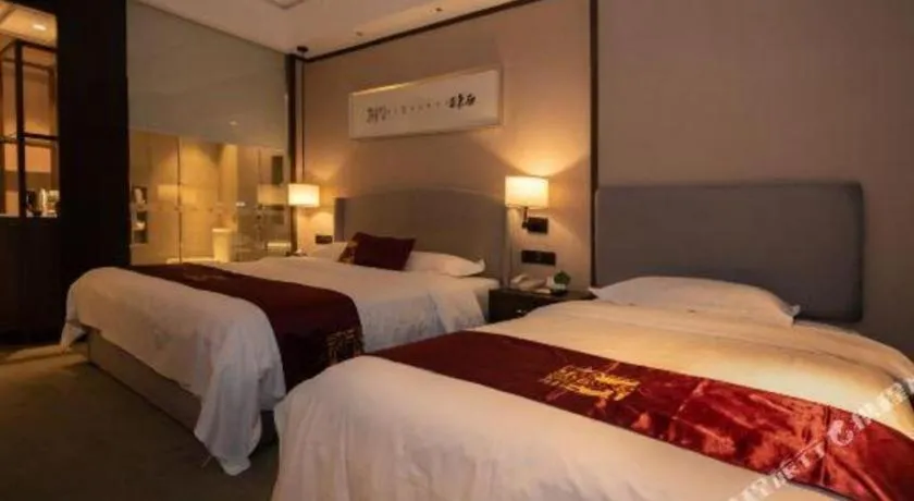 Bed in Zhuhai Starlight Hotel