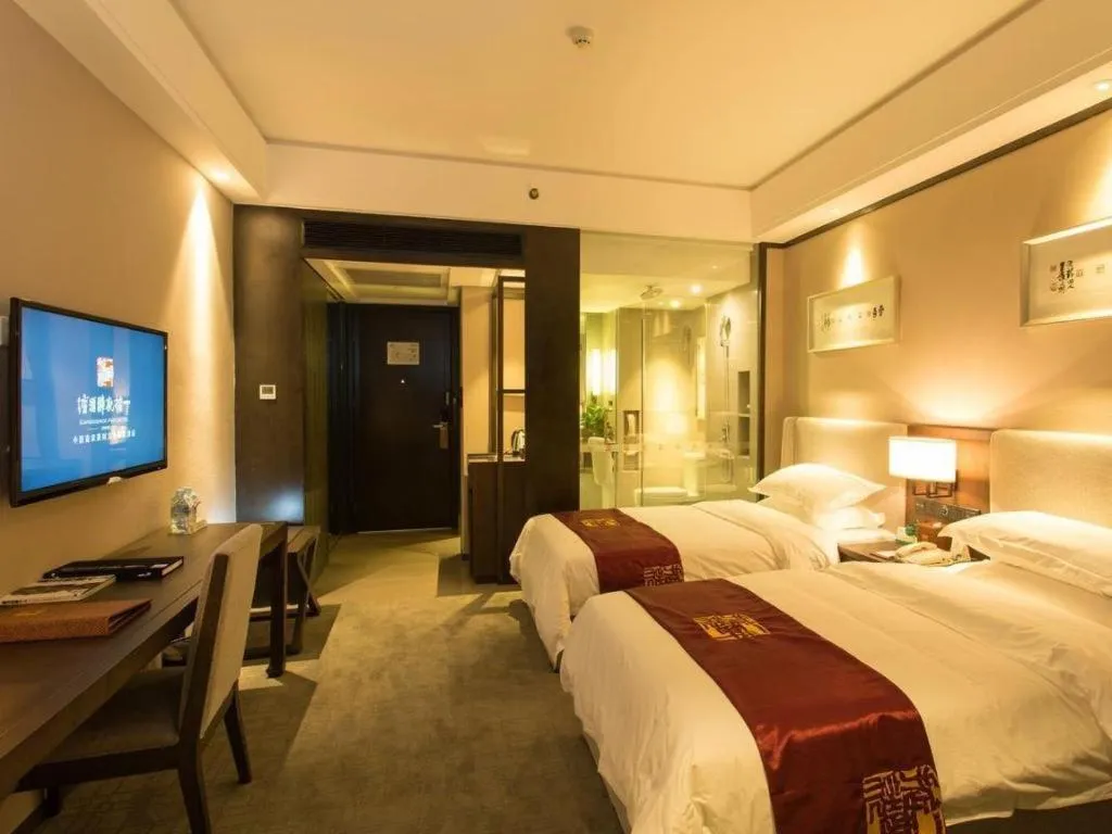 Bed in LIZ Hotel (Zhuhai Gongbei Port Fuhuali Store)