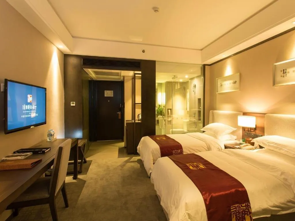 Bed in Zhuhai Starlight Hotel