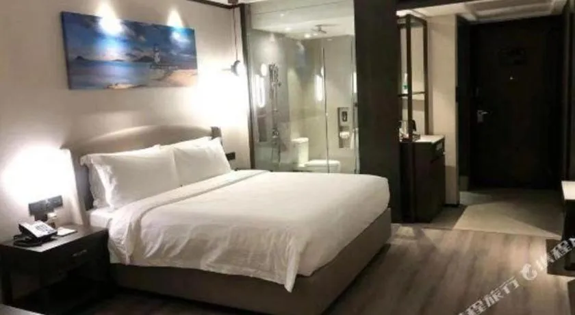 Bed in Zhuhai Starlight Hotel