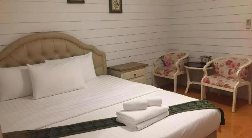 Bed in Ban Thungdang Housetel Bangkok