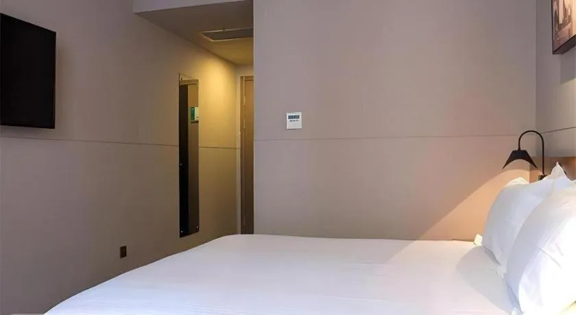 Bed in Jinjiang Inn Select Shanghai Nanjing Road Pedestrian Street