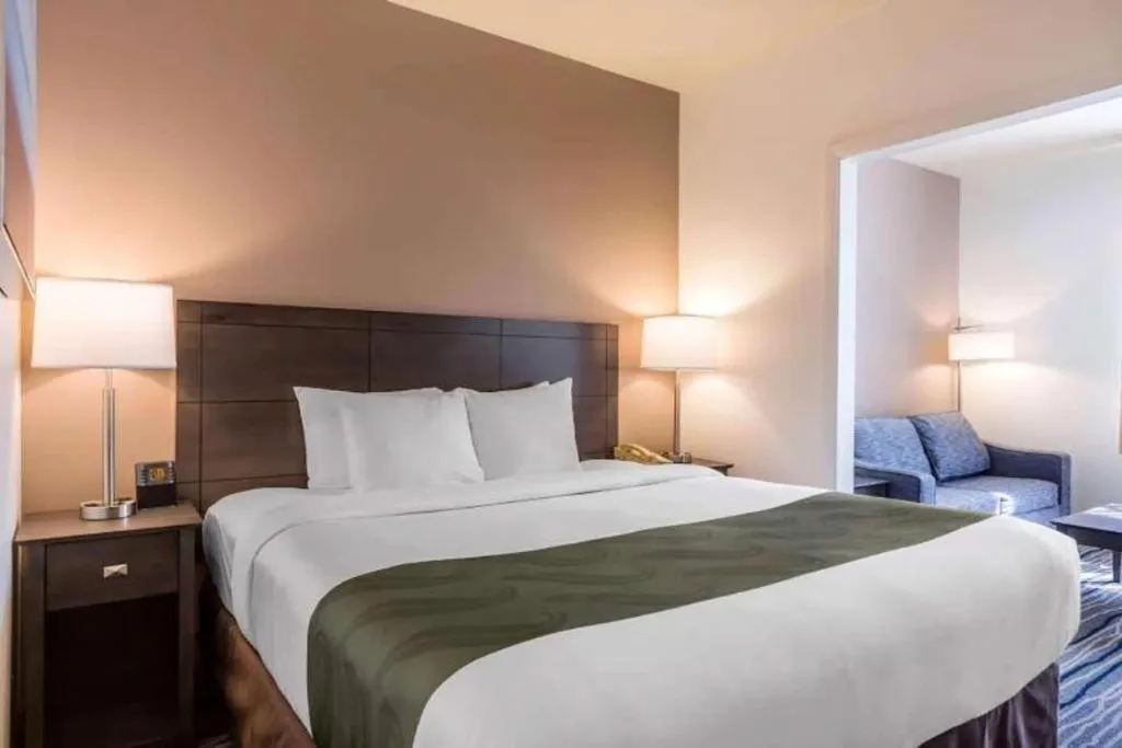 Bed in Ramada Suites by Wyndham San Diego