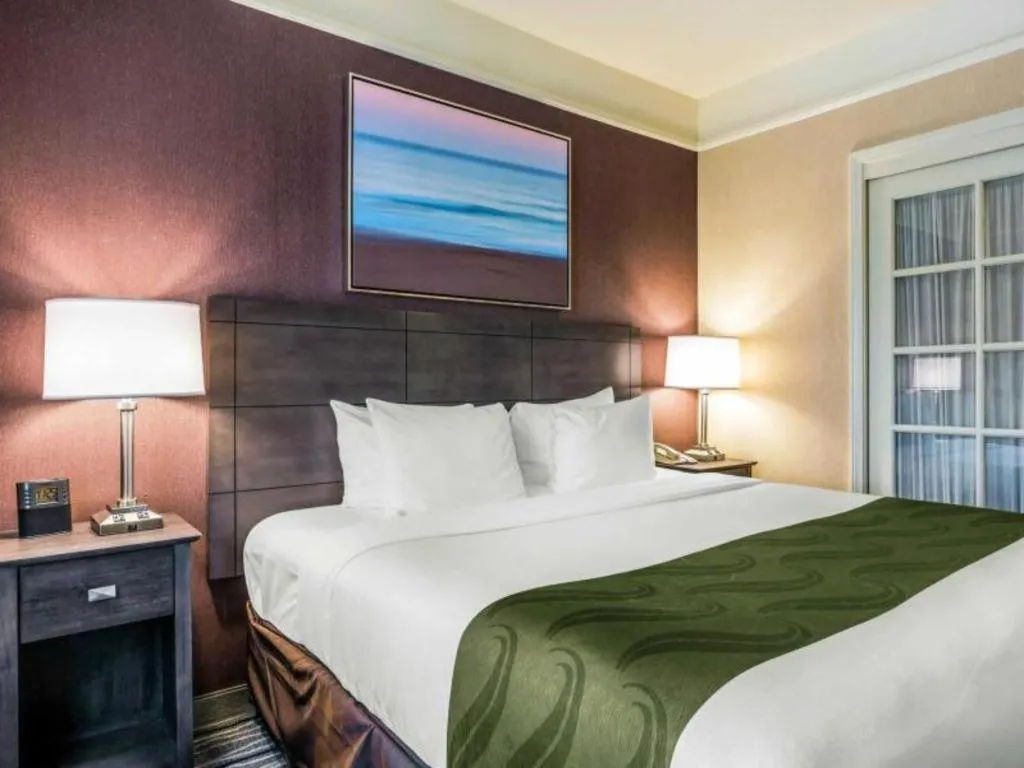 Bed in Ramada Suites by Wyndham San Diego