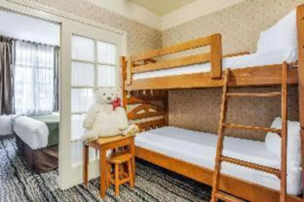 Bed in Ramada Suites by Wyndham San Diego