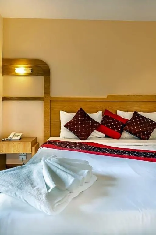 Bed in Eastiny Plaza hotel