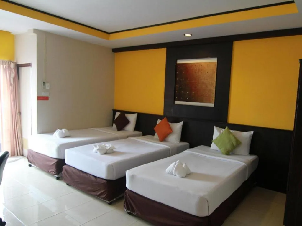 Bed in Grand Pinnacle Hotel