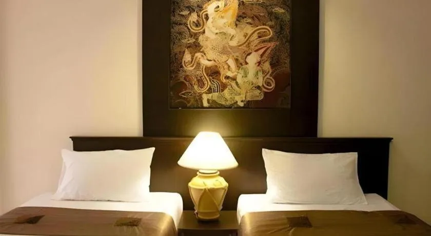 Bed in Grand Pinnacle Hotel