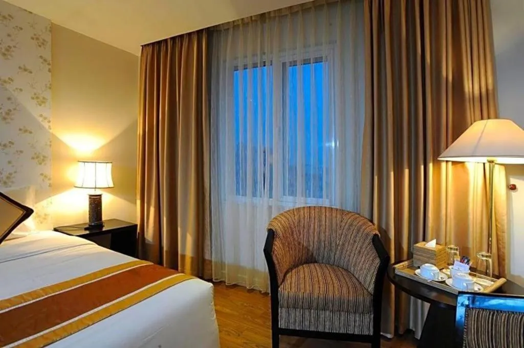 Bed in Cosiana Hotel