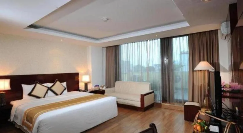 Bed in Cosiana Hotel