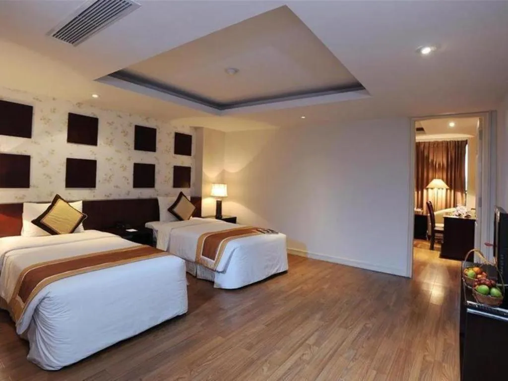 Bed in Cosiana Hotel