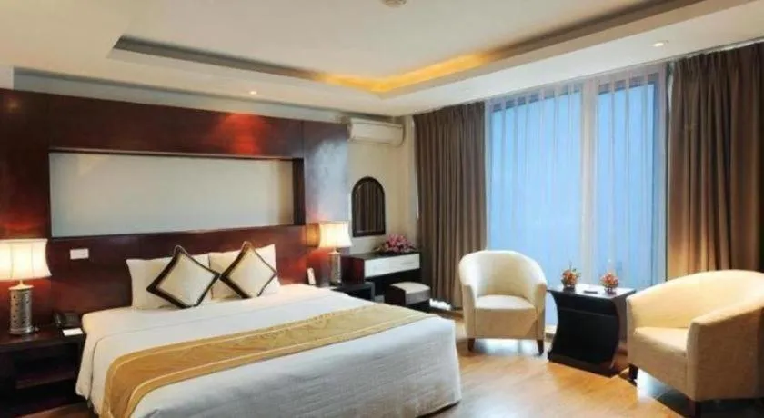 Bed in Cosiana Hotel