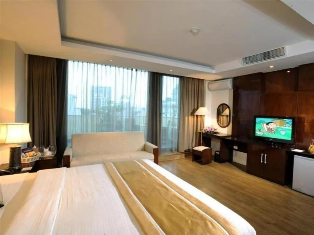 Bed in Cosiana Hotel