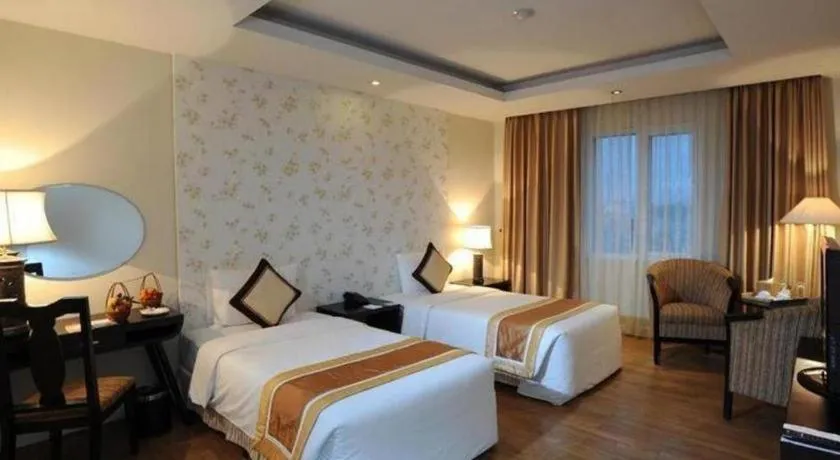 Bed in Cosiana Hotel