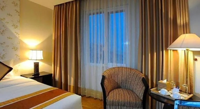 Bed in Cosiana Hotel