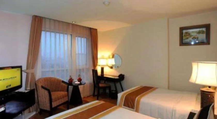 Bed in Cosiana Hotel