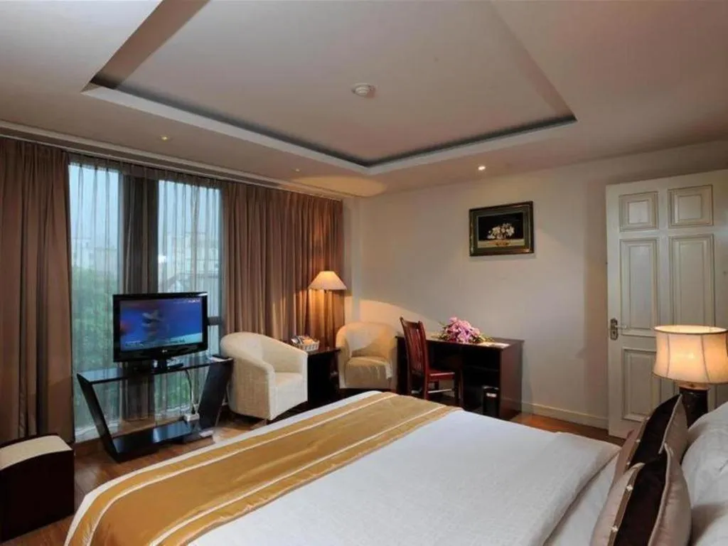 Bed in Cosiana Hotel