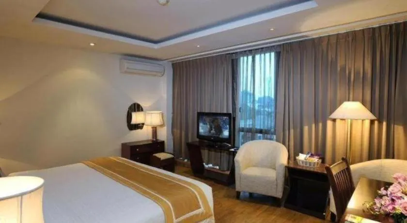 Bed in Cosiana Hotel