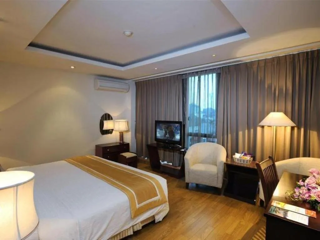 Bed in Cosiana Hotel