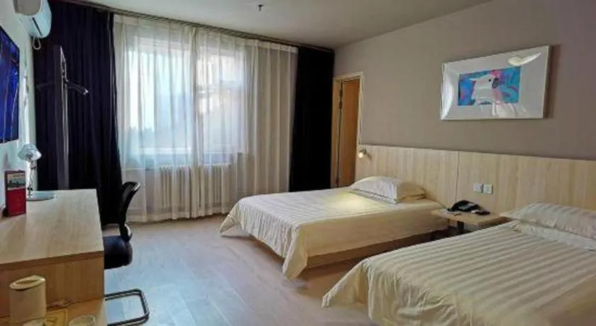 Bed in Jinjiang Inn Jinan Daming Lake