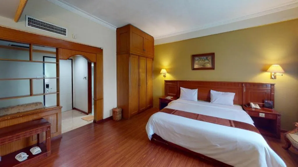 Bed in Madani Hotel Medan